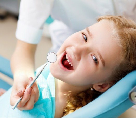 Young child receiving a dental exam