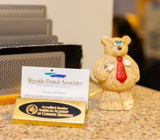 Stack of business cards for Westside Dental Associates