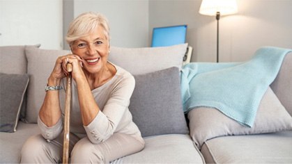 a woman smiling with new dentures