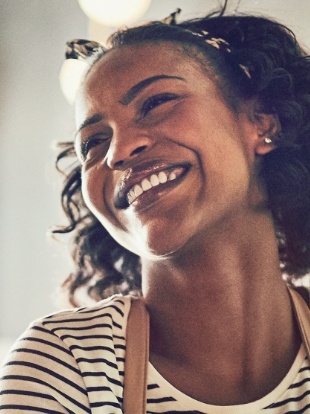 Smiling young woman with headband