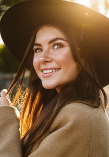 woman with hat smiling in West Los Angeles
