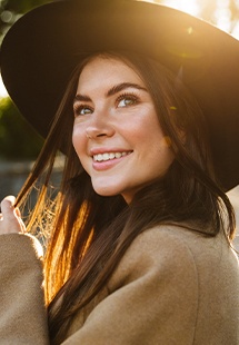 Woman with sunhat outdoors