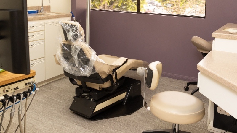 Black and beige dental exam chair