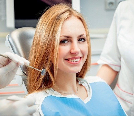 Young woman smiling during dental checkup