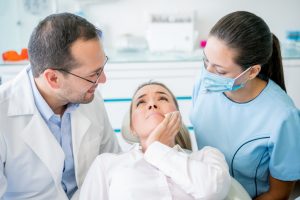 Ouch! I just lost a tooth – who can I see as an emergency dentist in Los Angeles? What are some dental first aid tips I can use until the dentist can see me? 