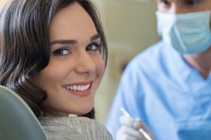 Smiling woman at the dentist