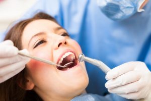 Woman in dentist's chair.