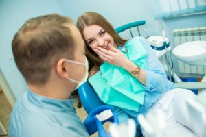 dentist debunking root canal myths in Los Angeles to a patient 