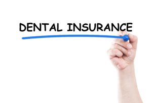 Hand underlining dental insurance